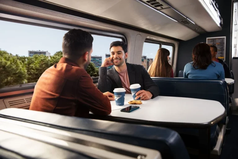 two people sitting in dining cart on amtrak