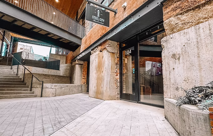 outside photo of steel city barber shop